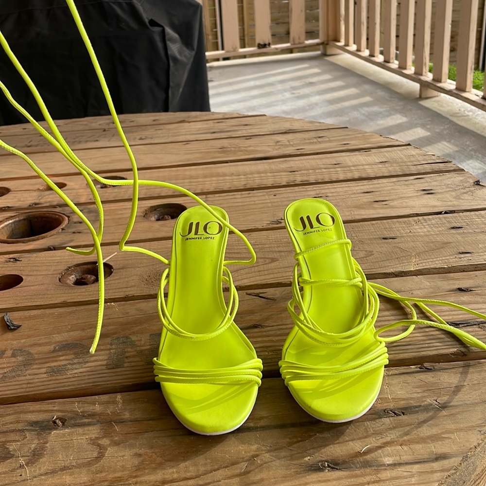 Neon yellow lace up heels.